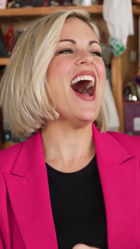 The Tiny Desk AI close-up: the lead singer laughing
