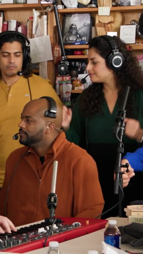 Tiny Desk AI video for coworkers: the band singing around the desk Tiny Desk AI video for coworkers: the band singing around the desk